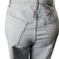 Light blue jeans on a mannequin with a white background