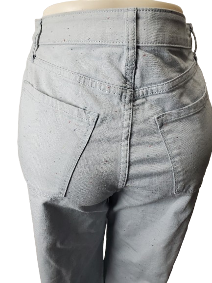 Light blue jeans on a mannequin with a white background