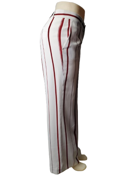 White pants with red stripes on a mannequin against a white background