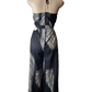 Black and white patterned dress on a mannequin against a white background