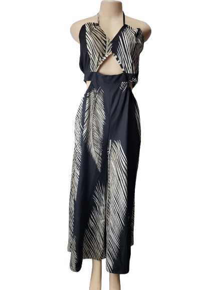 Black and white patterned dress on a mannequin against a white background