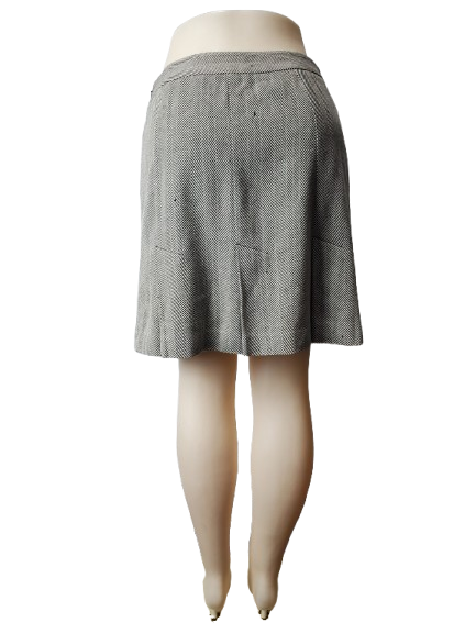 Gray checkered skirt on a mannequin with white background