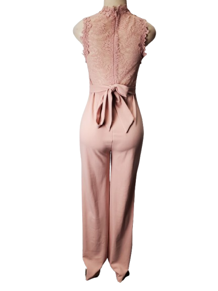 Pink lace jumpsuit on a mannequin against a white background