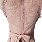 Pink lace top with a bow on a white background