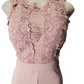 Pink lace top on a mannequin against a white background
