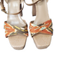 Pair of sandals with woven soles and colorful straps on a white background