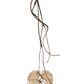 Pair of beige ballet shoes with ribbons on a white background