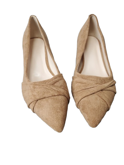 Pair of tan pointed-toe shoes with knotted design on a white background