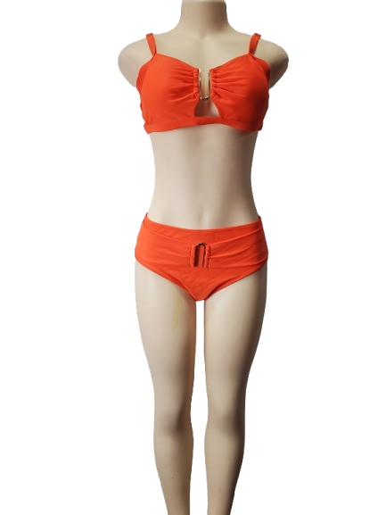 Orange bikini set on a mannequin against a white background