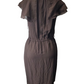 Brown dress on a mannequin against a white background