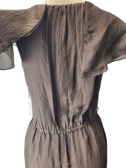Brown dress on a mannequin against a white background