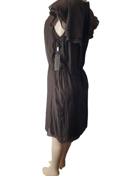 Brown dress on a mannequin with a white background