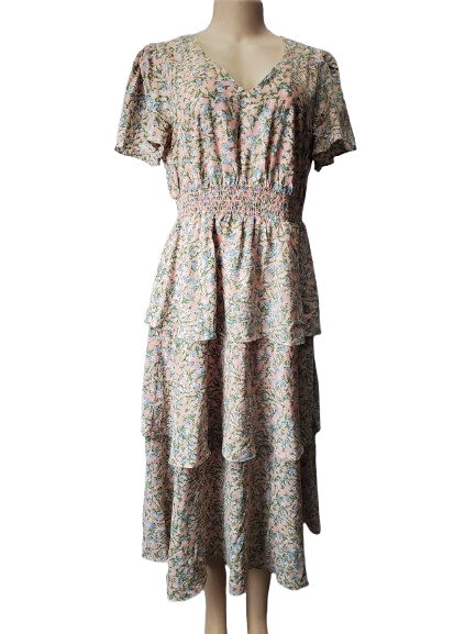 Floral dress on a mannequin against a white background