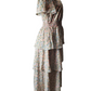 Floral dress on a mannequin against a white background