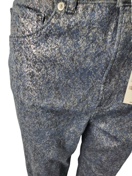 Blue denim jeans with a tag on a white background