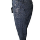 Dark blue jeans on a mannequin with a visible brand tag against a white background