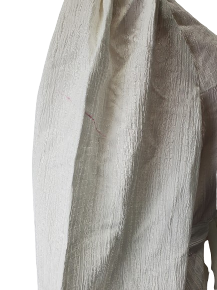Close-up of a textured fabric with a neutral color palette on a white background