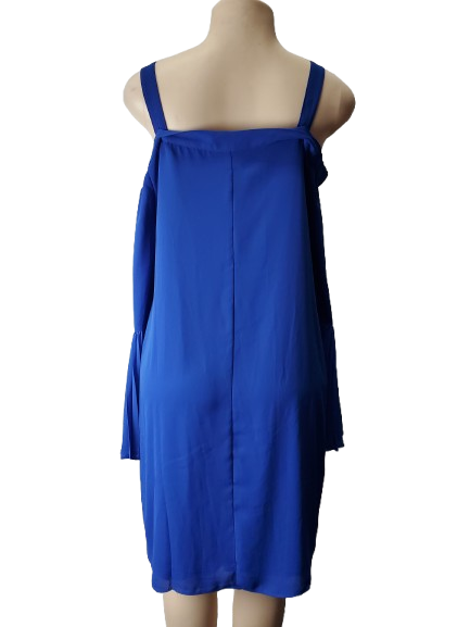 Blue dress on a mannequin against a white background