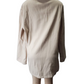 Beige coat on a mannequin against a white background