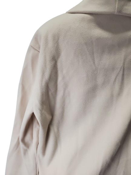 Close-up of a beige coat on a white background
