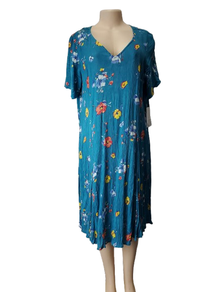 Blue floral dress on a mannequin against a white background