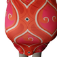 Colorful patterned skirt on a mannequin against a white background