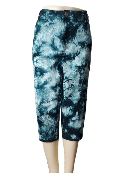 Tie-dye capri pants on a mannequin against a white background