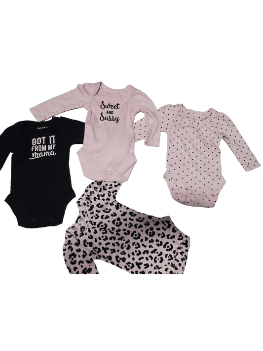 Collection of baby onesies with text and patterns on a white background