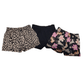 Two pairs of patterned shorts  on a white background