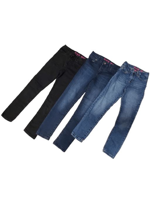 Two pairs of jeans, one blue and one black, on a white background.