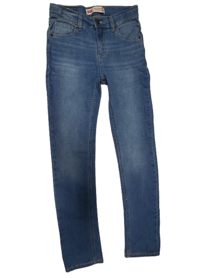 Blue jeans laid flat on a white background