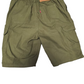 Green shorts with a brand tag on a white background