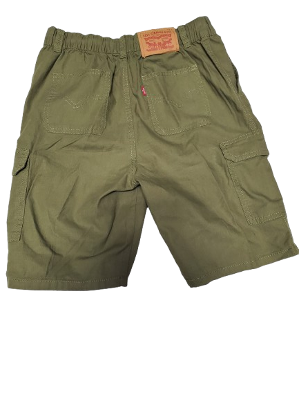 Green shorts with a brand tag on a white background