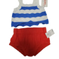 Blue and white striped baby romper and red baby shorts with tags on a white background