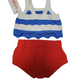 White tank top with blue and red stripes and red shorts on a white background