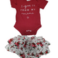 Red baby onesie with text and floral-patterned baby romper on a white background