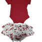 Red sleeveless top and floral-patterned fabric on a white background