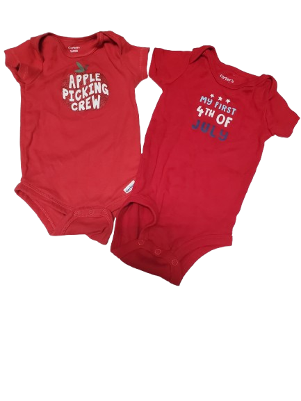 Two red baby onesies with text on a white background