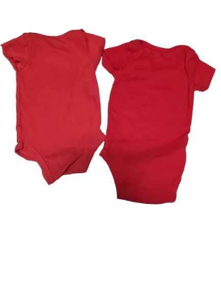 Two red sleeveless tops on a white background