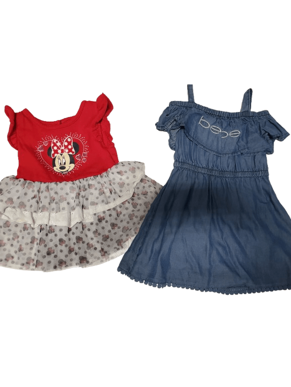 Three pieces of children's clothing including a floral dress, red shirt with graphic design, and denim skirt on a white background.