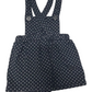 black polka dot overalls on a white background
