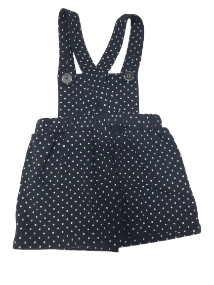 black polka dot overalls on a white background