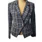 Plaid blazer on a mannequin against a white background