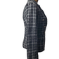 Black and white checkered suit jacket on a mannequin against a white background