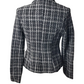 Black and white checkered blazer on a mannequin against a white background