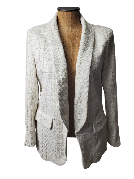 White textured blazer on a mannequin against a white background
