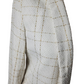 Close-up of a textured fabric with a grid pattern on a white background