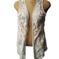 Lace vest on a mannequin against a white background