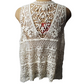 beige lace top on a mannequin with a white background