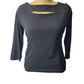 black long-sleeve top on a mannequin against a white background